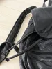 vintage 90s grunge leather patchwork backpack sold by Good Market Thrift Store