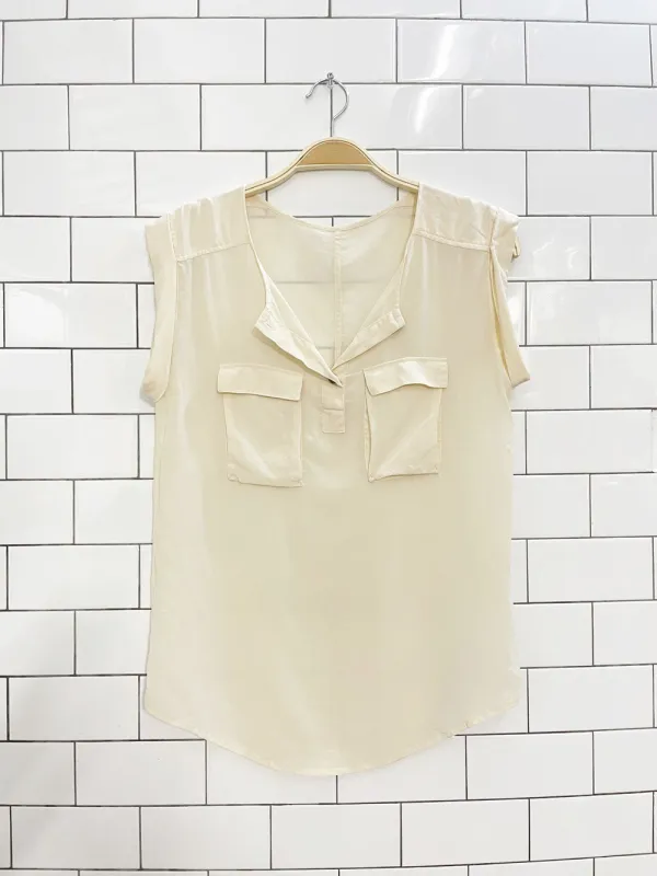 club monaco 100% silk cream sleeveless blouse sold by Good Market Thrift Store