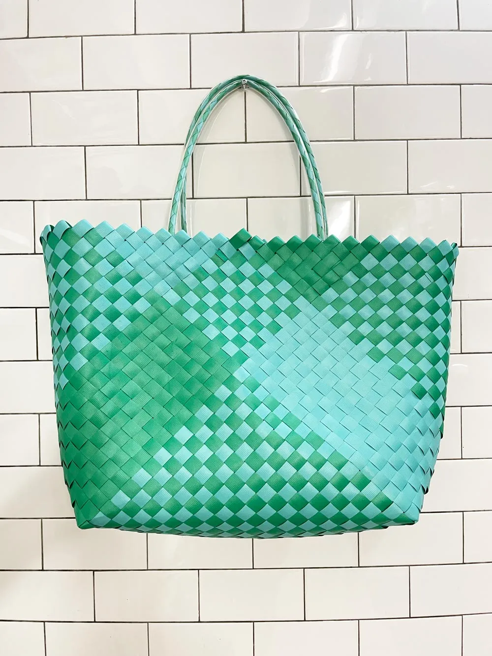 woven basket beach tote sold by Good Market Thrift Store