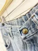 vintage 90s legendary gold ripped jeans sold by Good Market Thrift Store