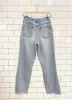 vintage 90s legendary gold ripped jeans sold by Good Market Thrift Store
