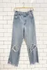vintage 90s legendary gold ripped jeans sold by Good Market Thrift Store