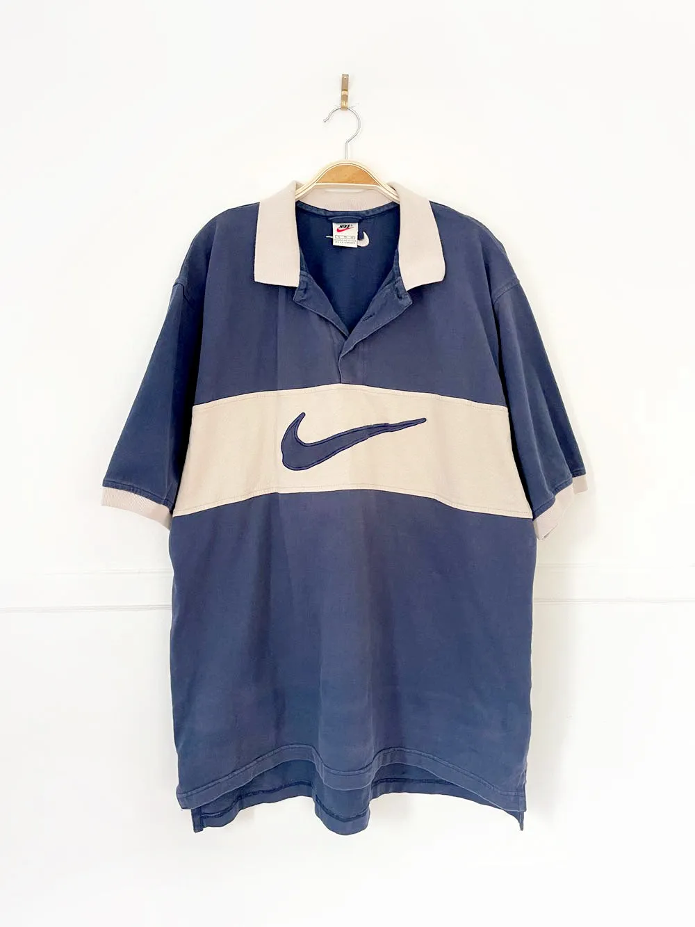 vintage 90s big swoosh colour block band polo sold by Good Market Thrift Store