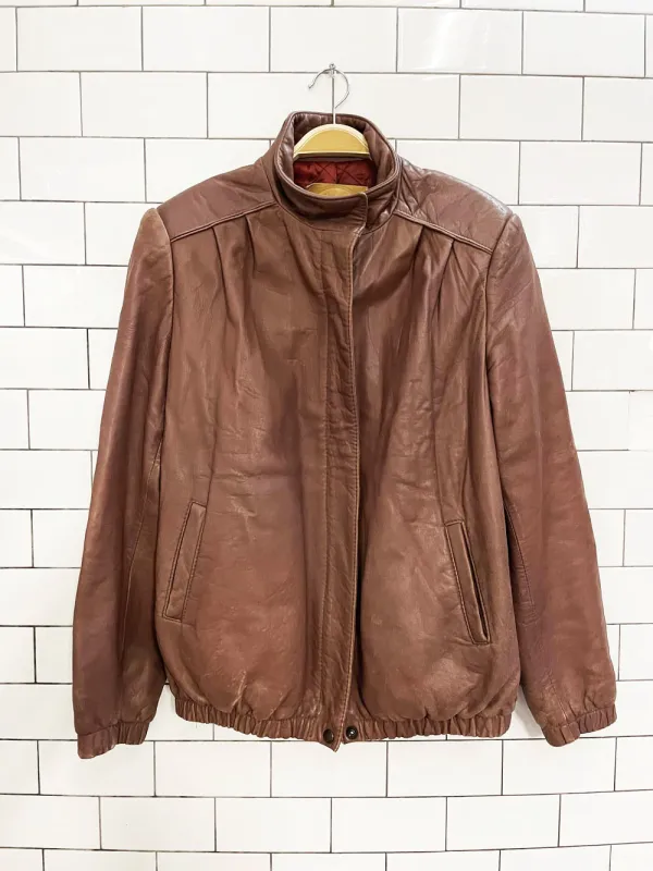vintage 70s the old hide house lamb leather pleated shoulder bomber jacket sold by Good Market Thrift Store