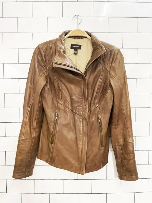 danier butter leather asymmetrical zip biker jacket sold by Good Market Thrift Store