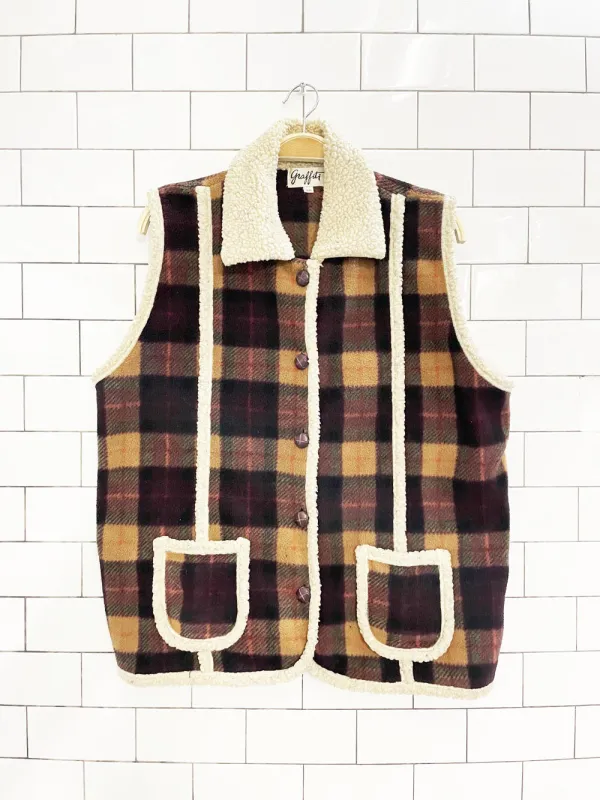 vintage 90s graffiti sherpa trim plaid fleece vest sold by Good Market Thrift Store
