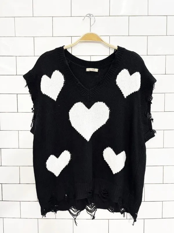 made in italy distressed knit heart sweater vest sold by Good Market Thrift Store