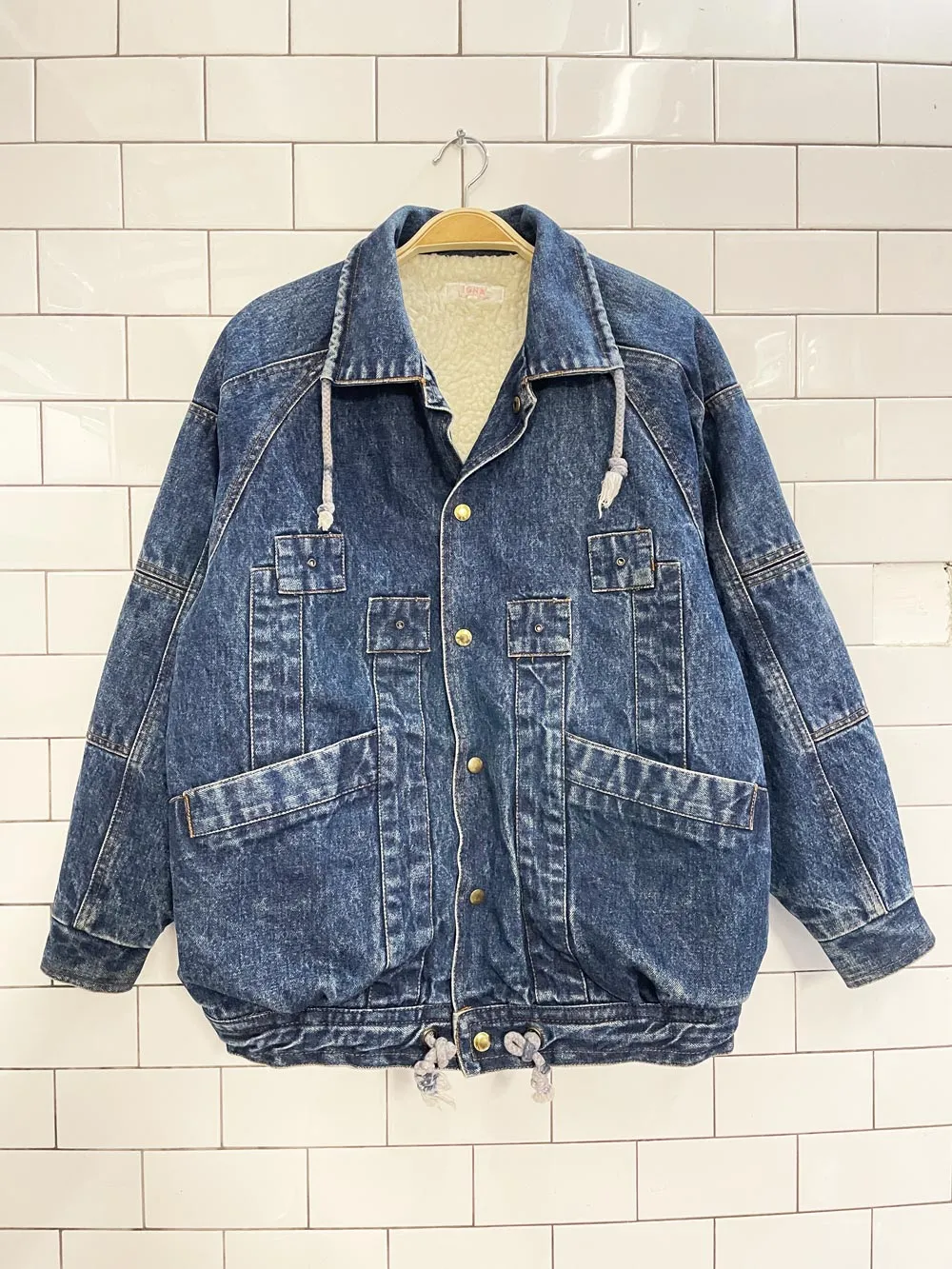 vintage 90s IONA sherpa lined denim bomber jacket sold by Good Market Thrift Store