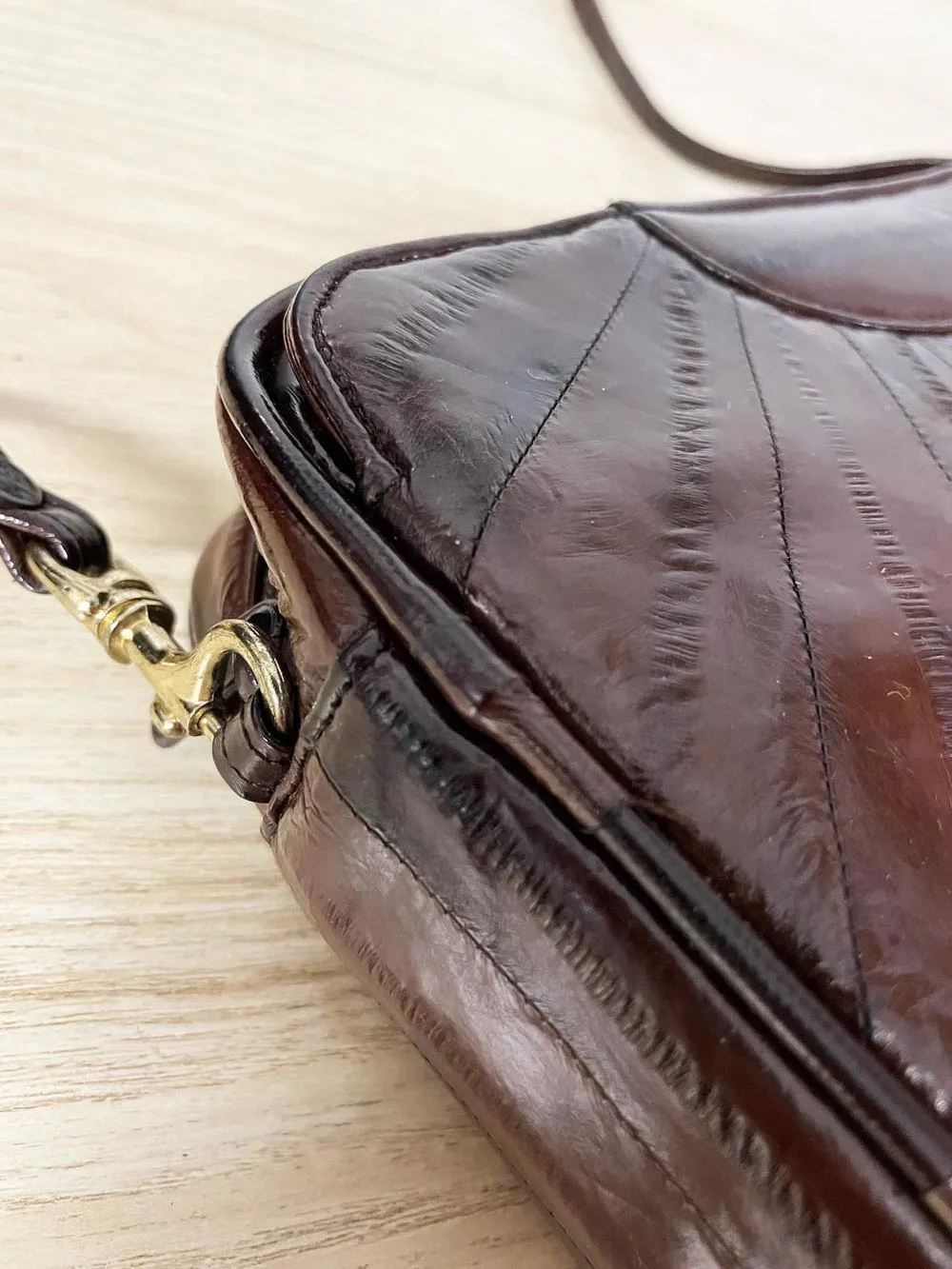 vintage 80s eelskin leather crossbody bag sold by Good Market Thrift Store product image thumbnail 2