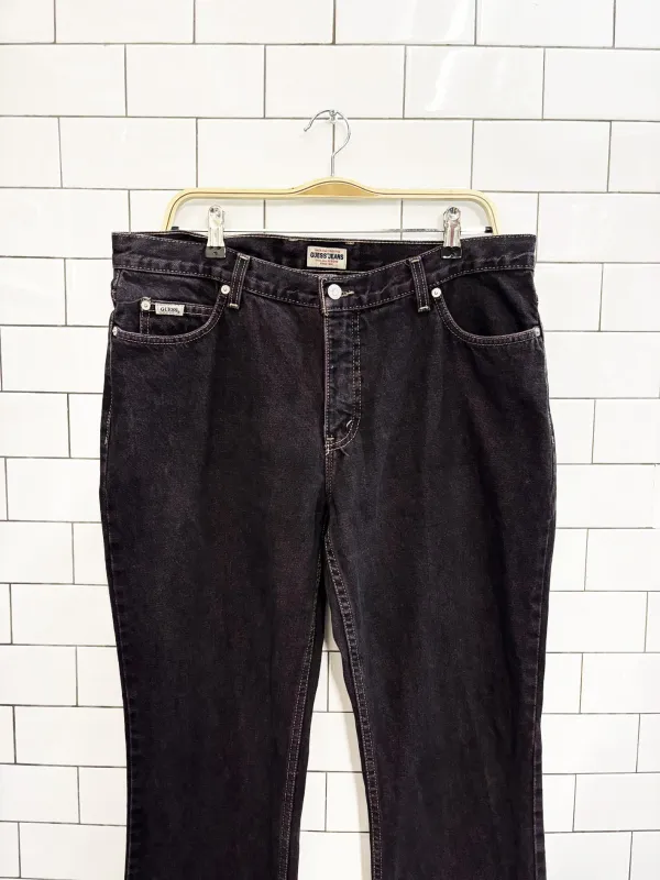 vintage 90s guess purple wash bootcut jeans sold by Good Market Thrift Store
