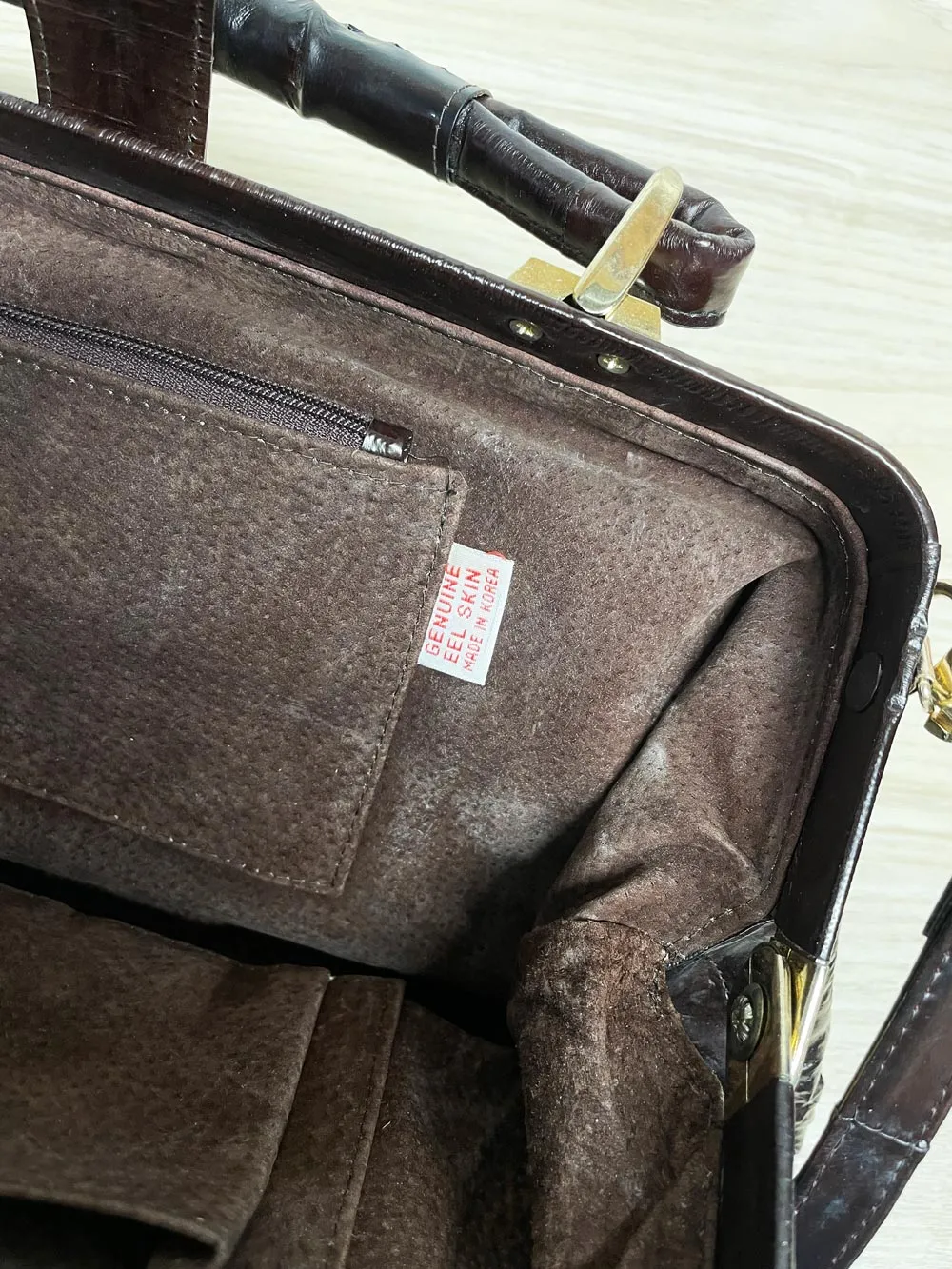 vintage 80s eelskin leather satchel | suede lining | made in korea sold by Good Market Thrift Store product image thumbnail 5