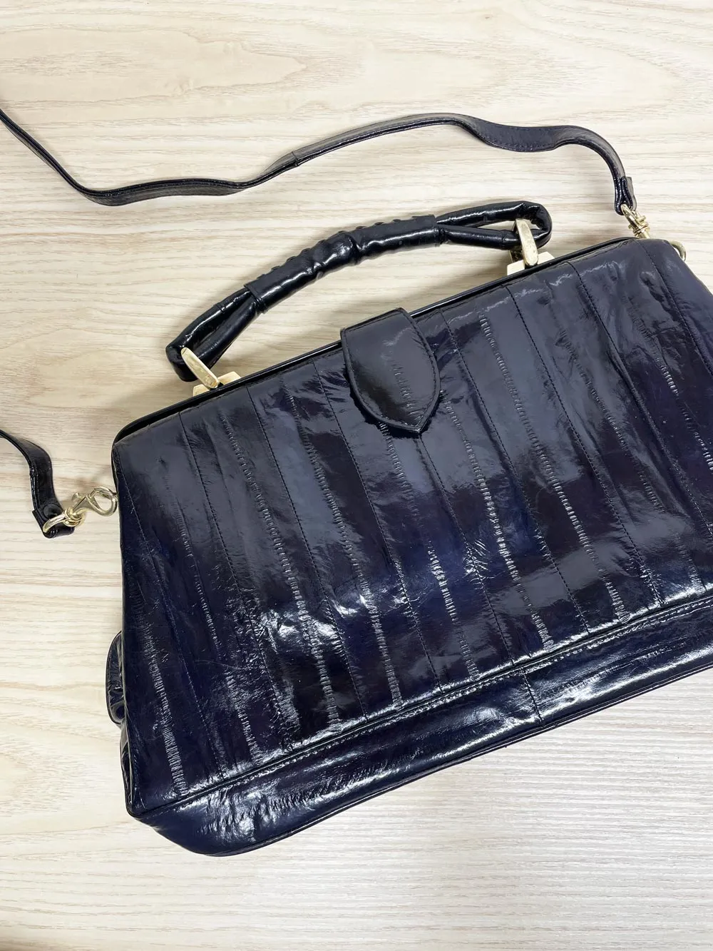 vintage 80s eelskin leather satchel | suede lining | made in korea sold by Good Market Thrift Store