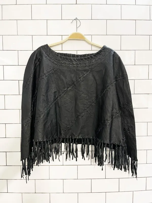 vintage 90s newport news braided leather fringe poncho sold by Good Market Thrift Store