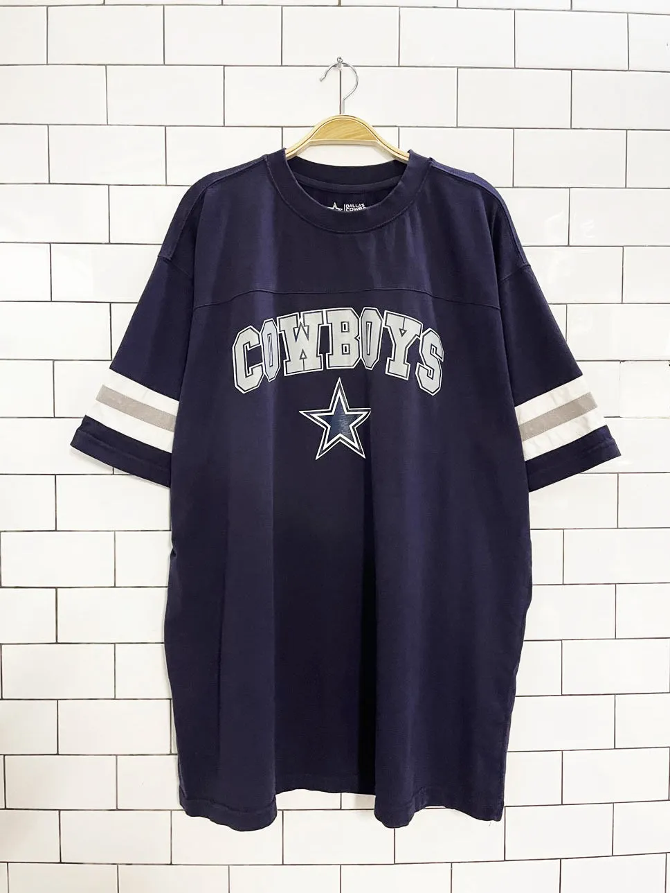 dallas cowboys oversized striped sleeve jersey tee sold by Good Market Thrift Store