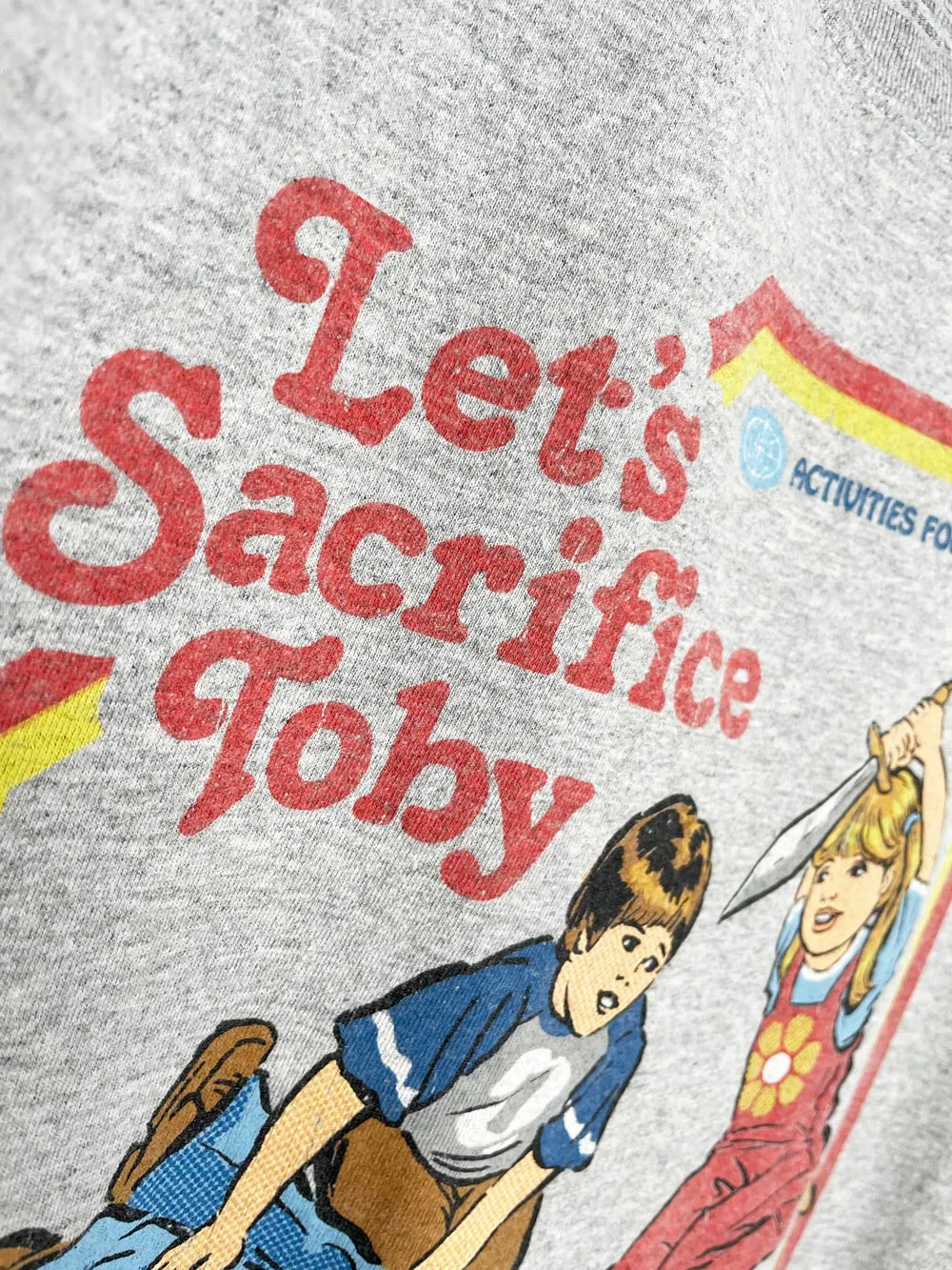 steven rhodes let's sacrifice toby graphic tee | halloween sold by Good Market Thrift Store product image thumbnail 2