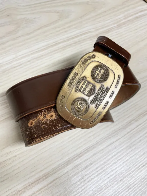 vintage 00s alberta wildlife buckle leather belt sold by Good Market Thrift Store