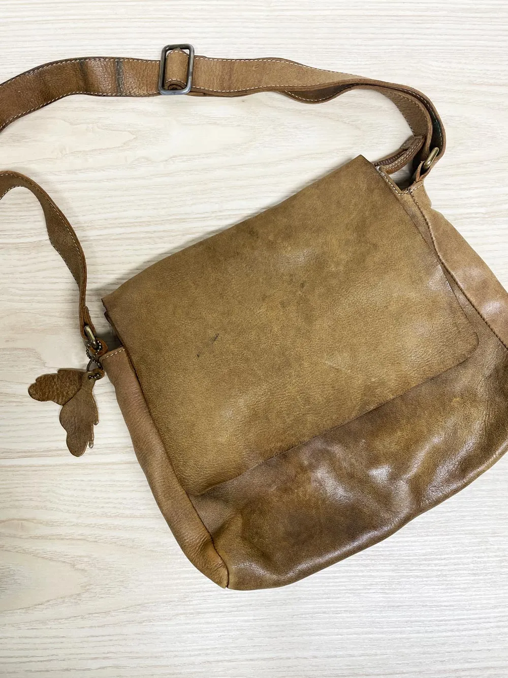 vintage roots tribe raiders leather messenger bag sold by Good Market Thrift Store