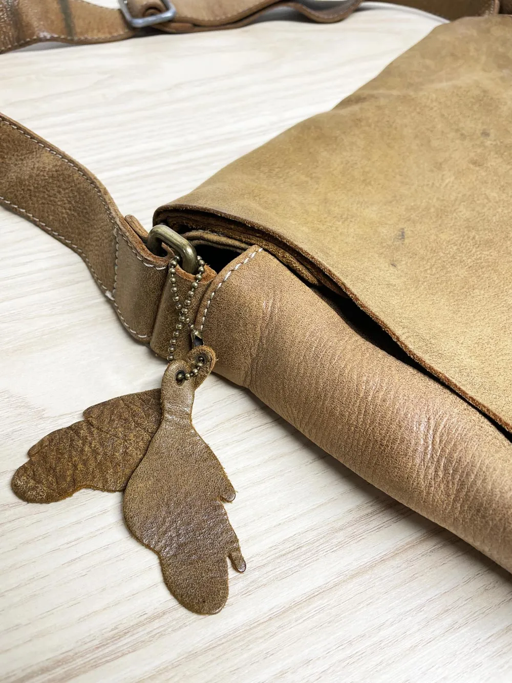 vintage roots tribe raiders leather messenger bag sold by Good Market Thrift Store product image thumbnail 2