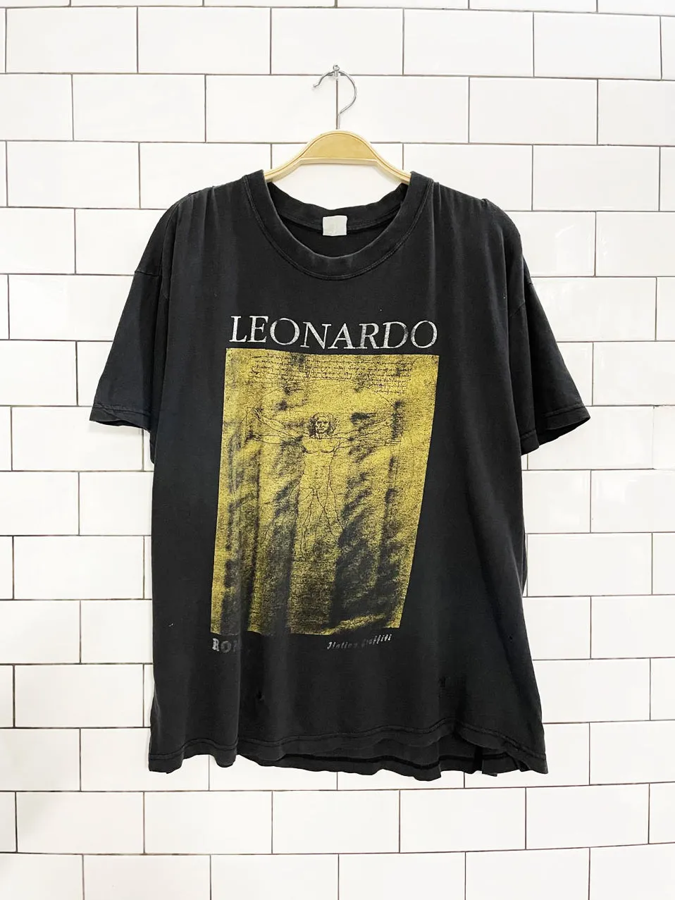 vintage 90s leonardo da vinci vitruvian man art faded distressed tee sold by Good Market Thrift Store