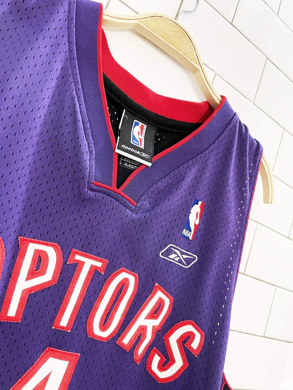 vintage 00s raptors chris bosh #4 reebok NBA jersey | 03-04 away sold by Good Market Thrift Store product image thumbnail 3