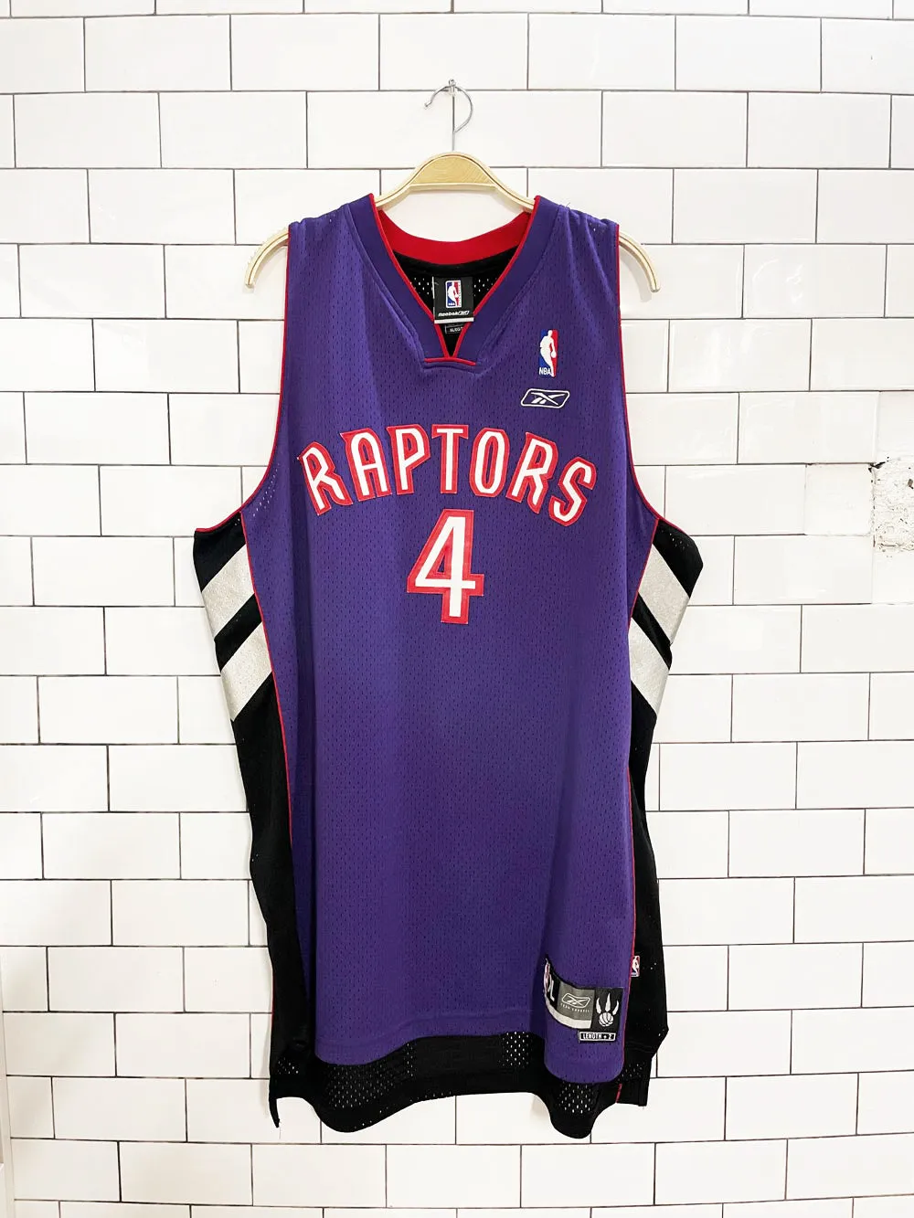 vintage 00s raptors chris bosh #4 reebok NBA jersey | 03-04 away sold by Good Market Thrift Store