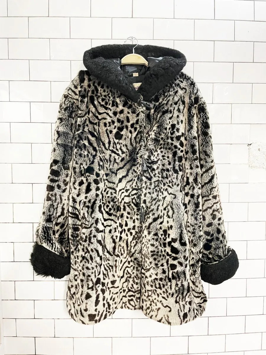 vintage 00s tanjay faux fur animal print hooded coat sold by Good Market Thrift Store