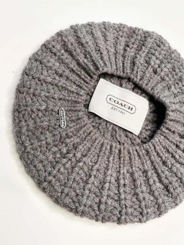 coach alpaca-merino wool knit beret sold by Good Market Thrift Store