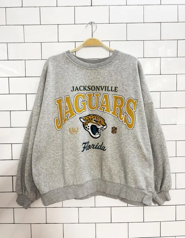 h&m x nfl jacksonville jaguars crewneck sweatshirt sold by Good Market Thrift Store