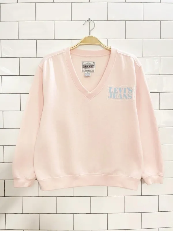 vintage 90s levi's white tab pink v-neck sweatshirt sold by Good Market Thrift Store
