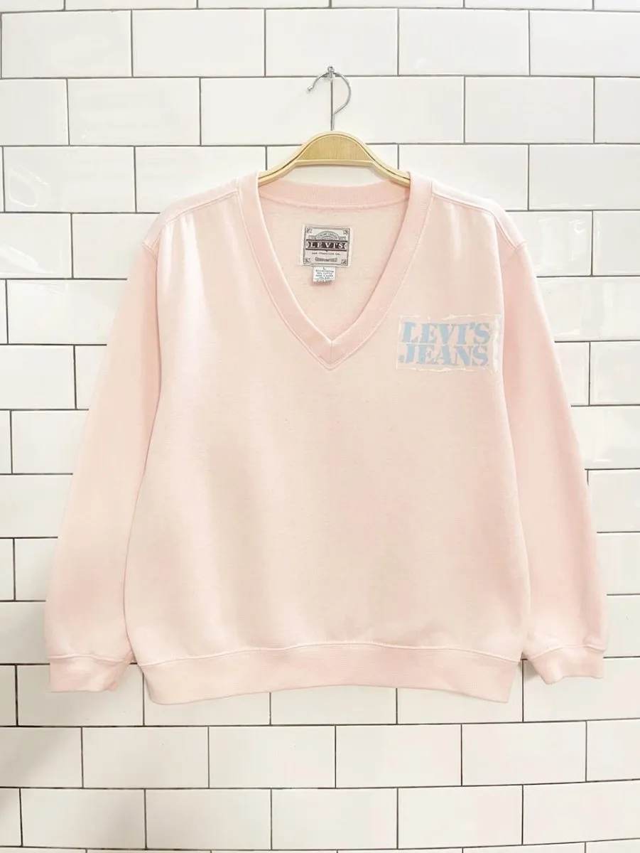 vintage 90s levi's white tab pink v-neck sweatshirt sold by Good Market Thrift Store