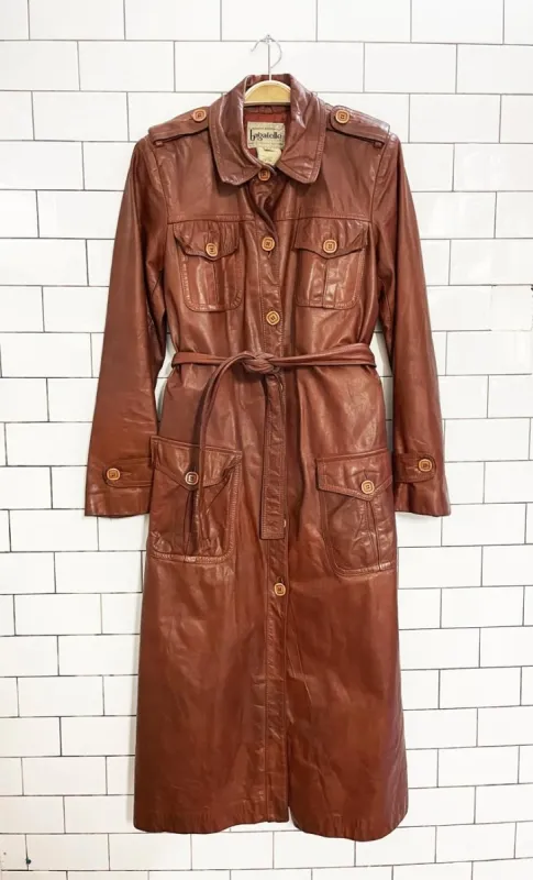 vintage bagatelle utility belted leather trench coat | magaret godfrew sold by Good Market Thrift Store