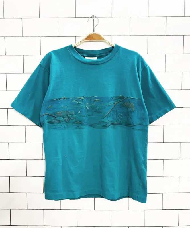 vintage 90s northern reflections faded pond scene tee sold by Good Market Thrift Store
