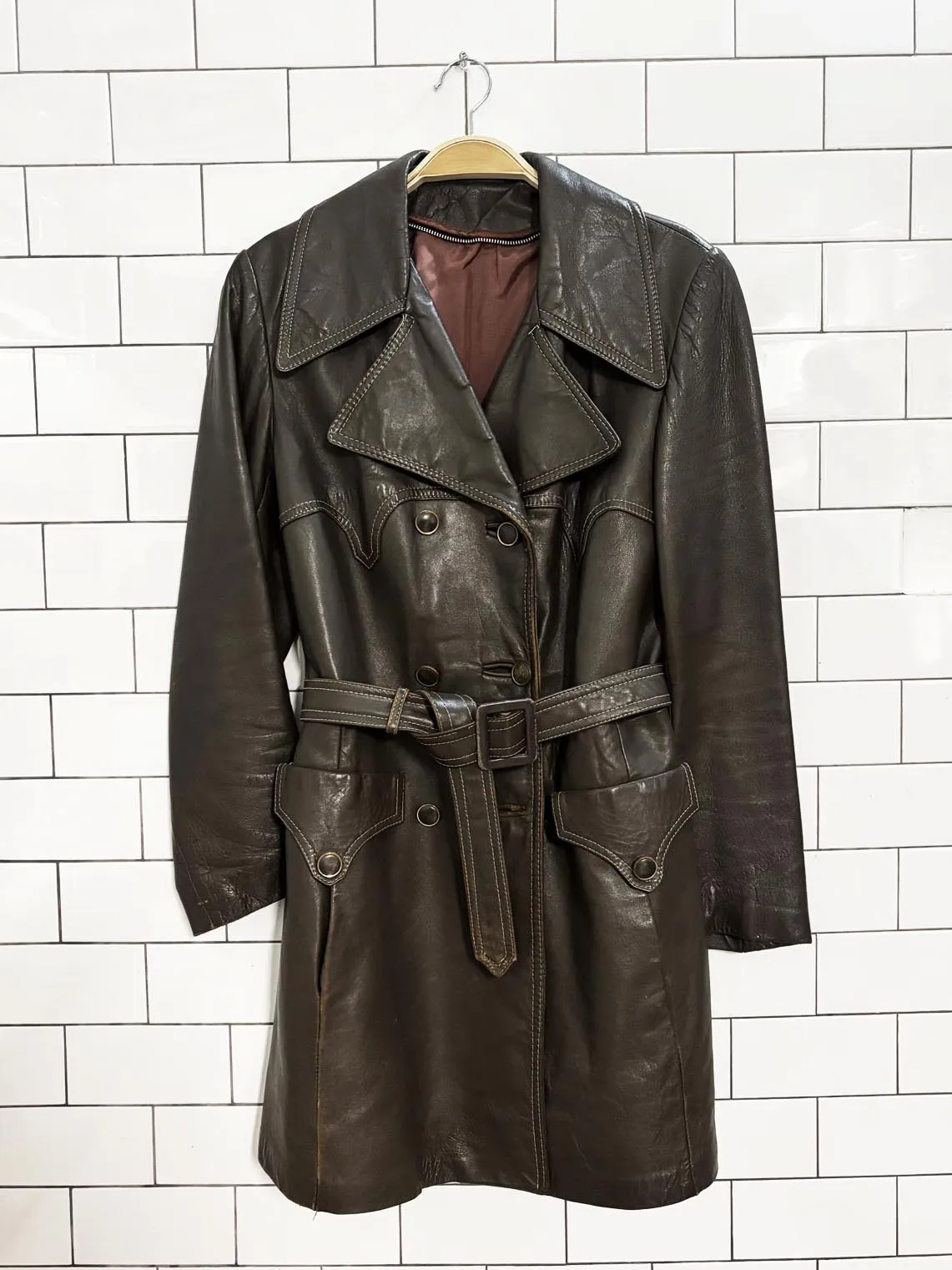 vintage 70s olympic leather western belted trench coat sold by Good Market Thrift Store