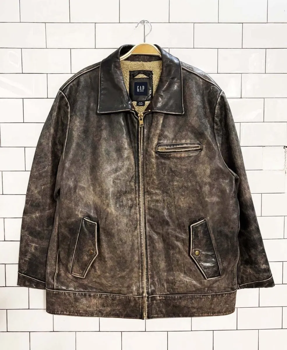 vintage 90s gap leather sherpa lined bomber jacket sold by Good Market Thrift Store