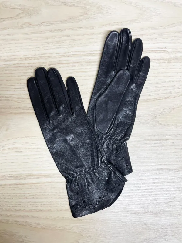 vintage eyelet cuff leather gloves | unlined sold by Good Market Thrift Store