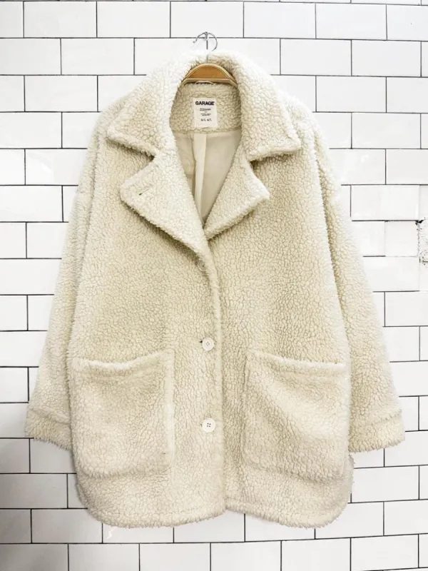 garage oversized sherpa teddy coat sold by Good Market Thrift Store