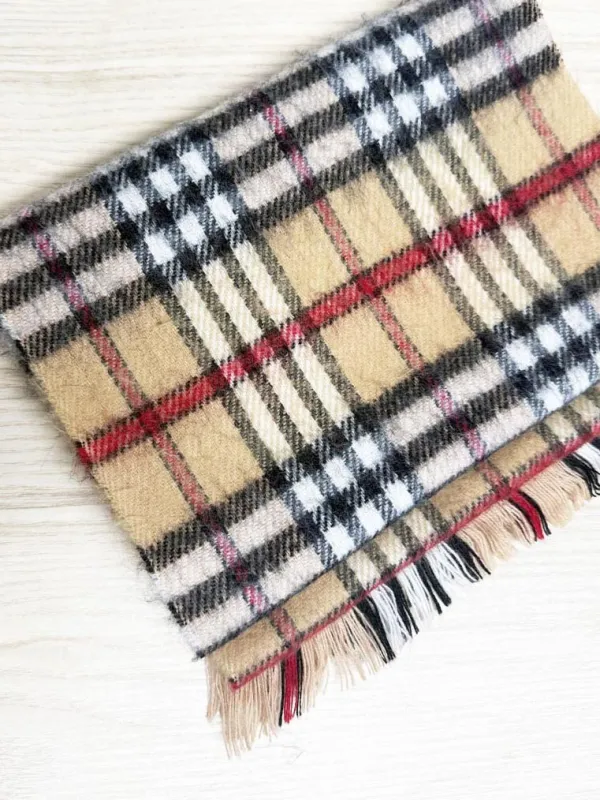 vintage fuzzy tartan fringe scarf sold by Good Market Thrift Store
