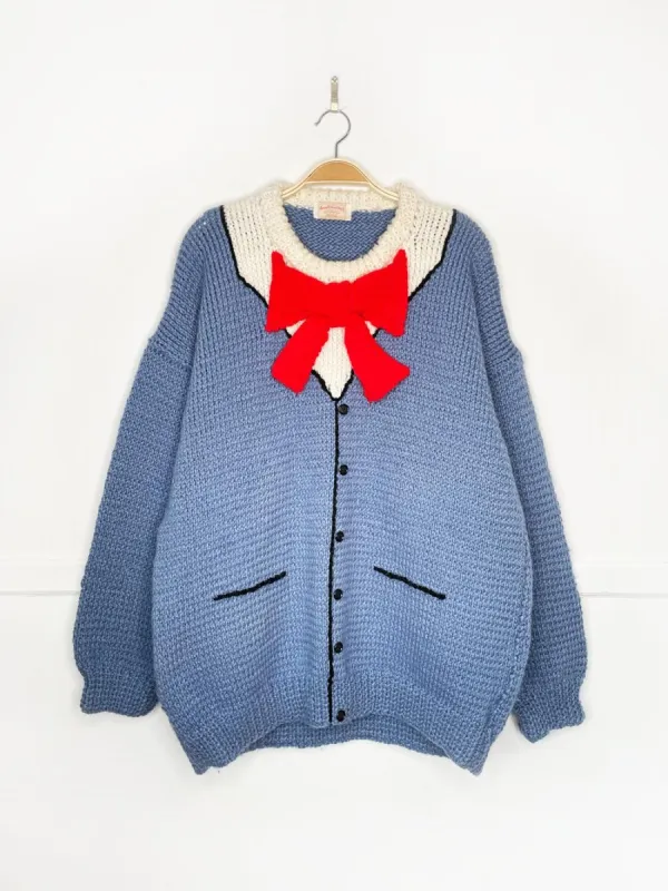 vintage hand-knit christmas morning knit sweater sold by Good Market Thrift Store