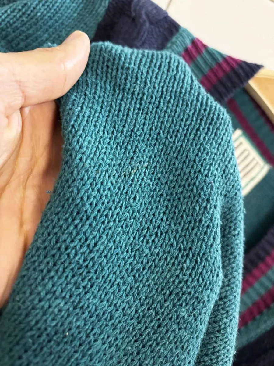 vintage 90s IOU cable knit v-neck sweater sold by Good Market Thrift Store product image thumbnail 5