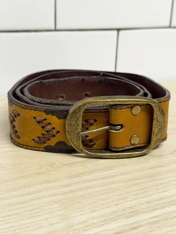 vintage harness leather stitched western belt | made in Haiti sold by Good Market Thrift Store