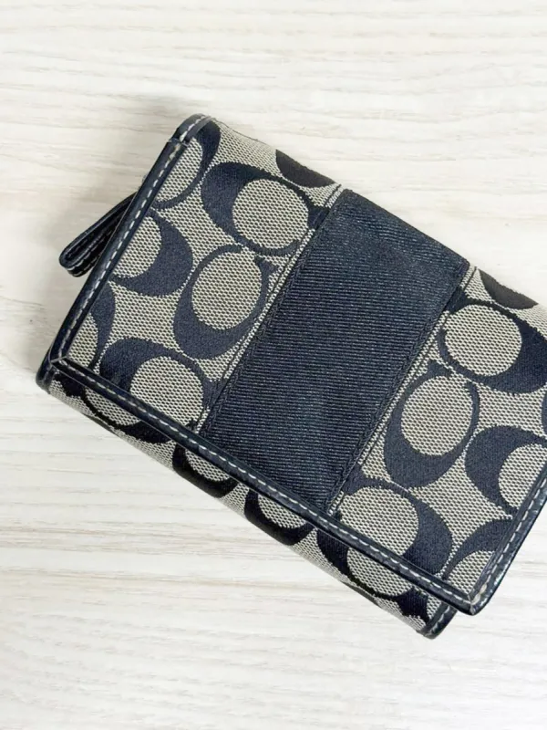 vintage coach leather and canvas monogram snap button wallet sold by Good Market Thrift Store