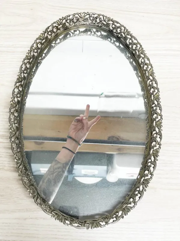 vintage brass framed ornate oval vanity mirror tray made by Good Market Thrift Store