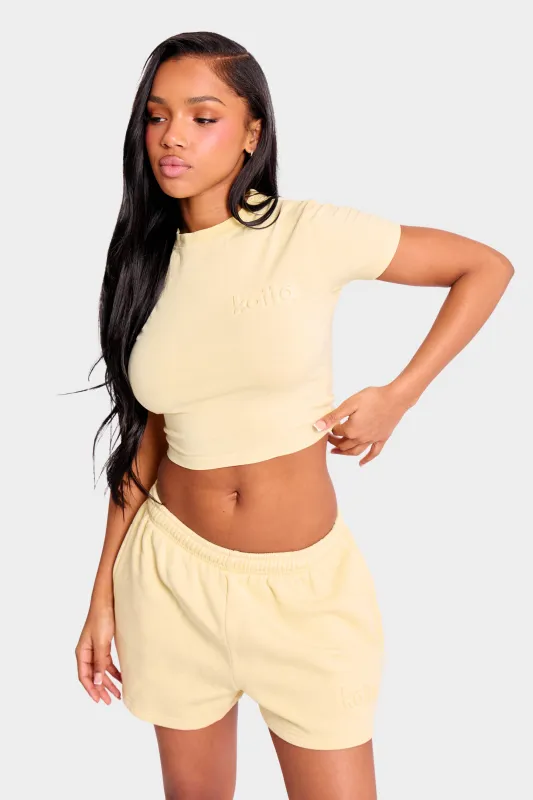 Kaiia Embossed Mini Sweat Shorts Washed Butter Yellow made by Kaiia the label