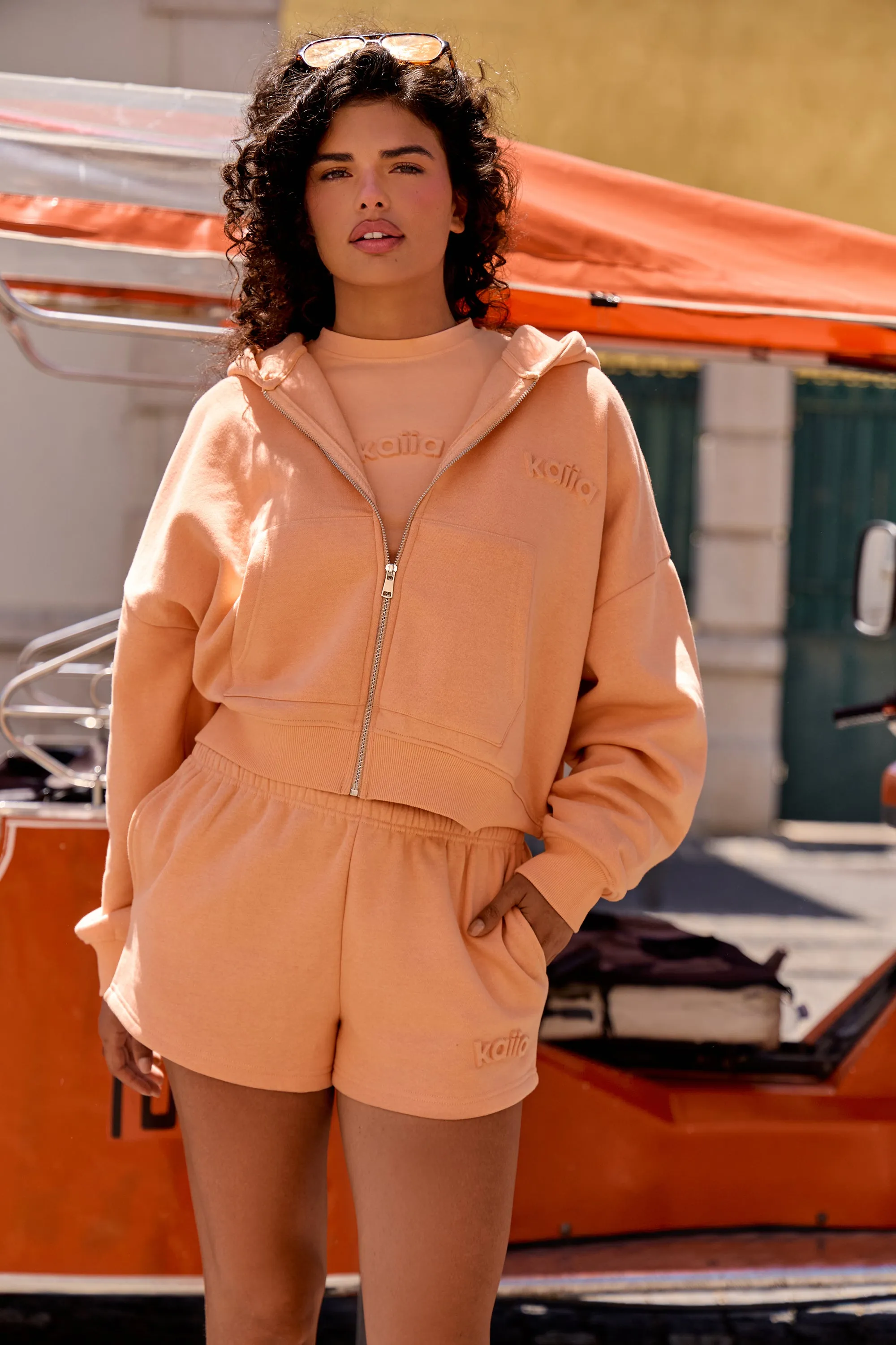 Kaiia Embossed Logo Oversized Zip Through Hoodie Peach sold by Kaiia the label