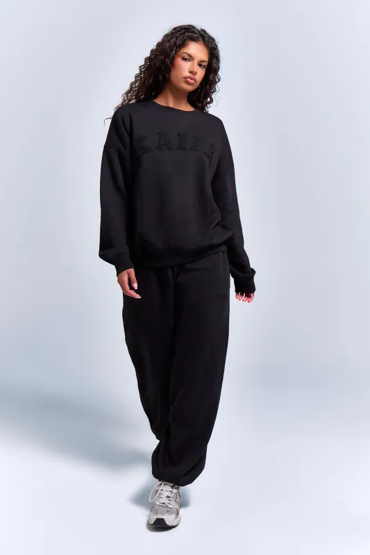 Kaiia Logo Cuffed Joggers Black made by Kaiia the label