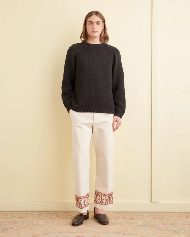 Cross-Stitched Rose Garland Trousers sold by BODE