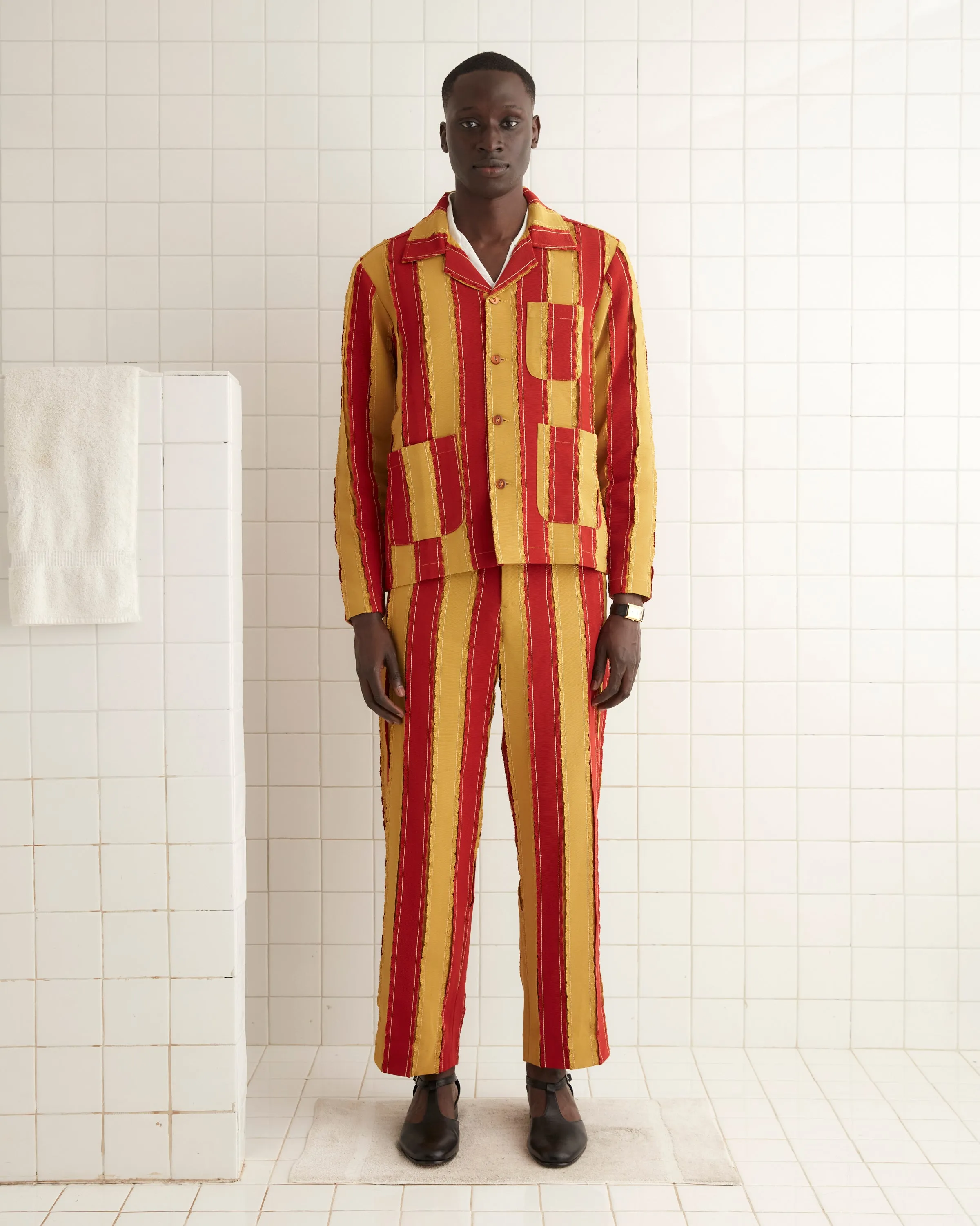 Winner's Sash Trousers sold by BODE