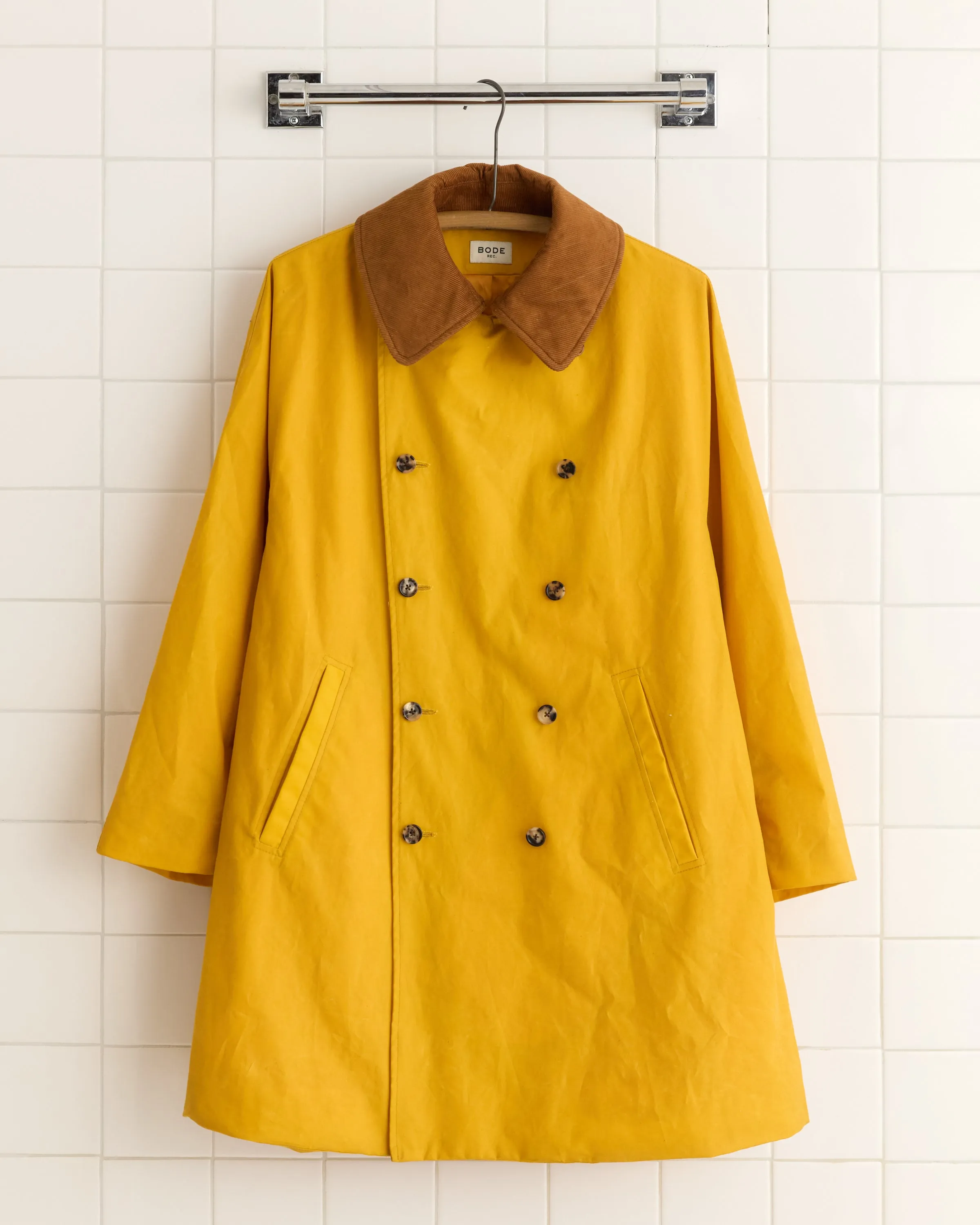 Waxed Peacoat - Yellow sold by BODE