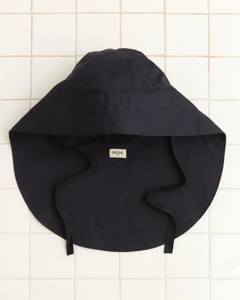 Waxed Herringbone Rain Hat - Navy sold by BODE