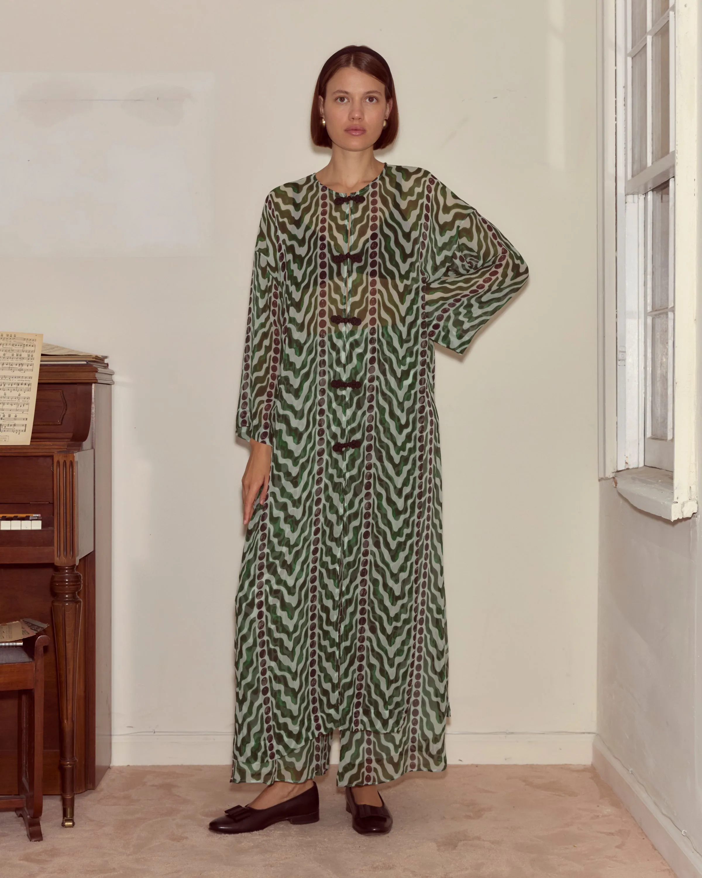 Serpentine Kaftan sold by BODE